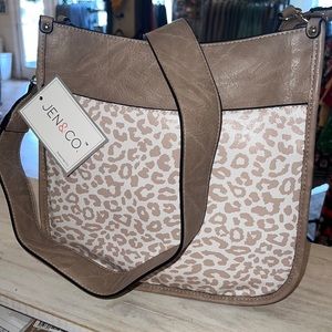 Cream colored leopard medium sized purse